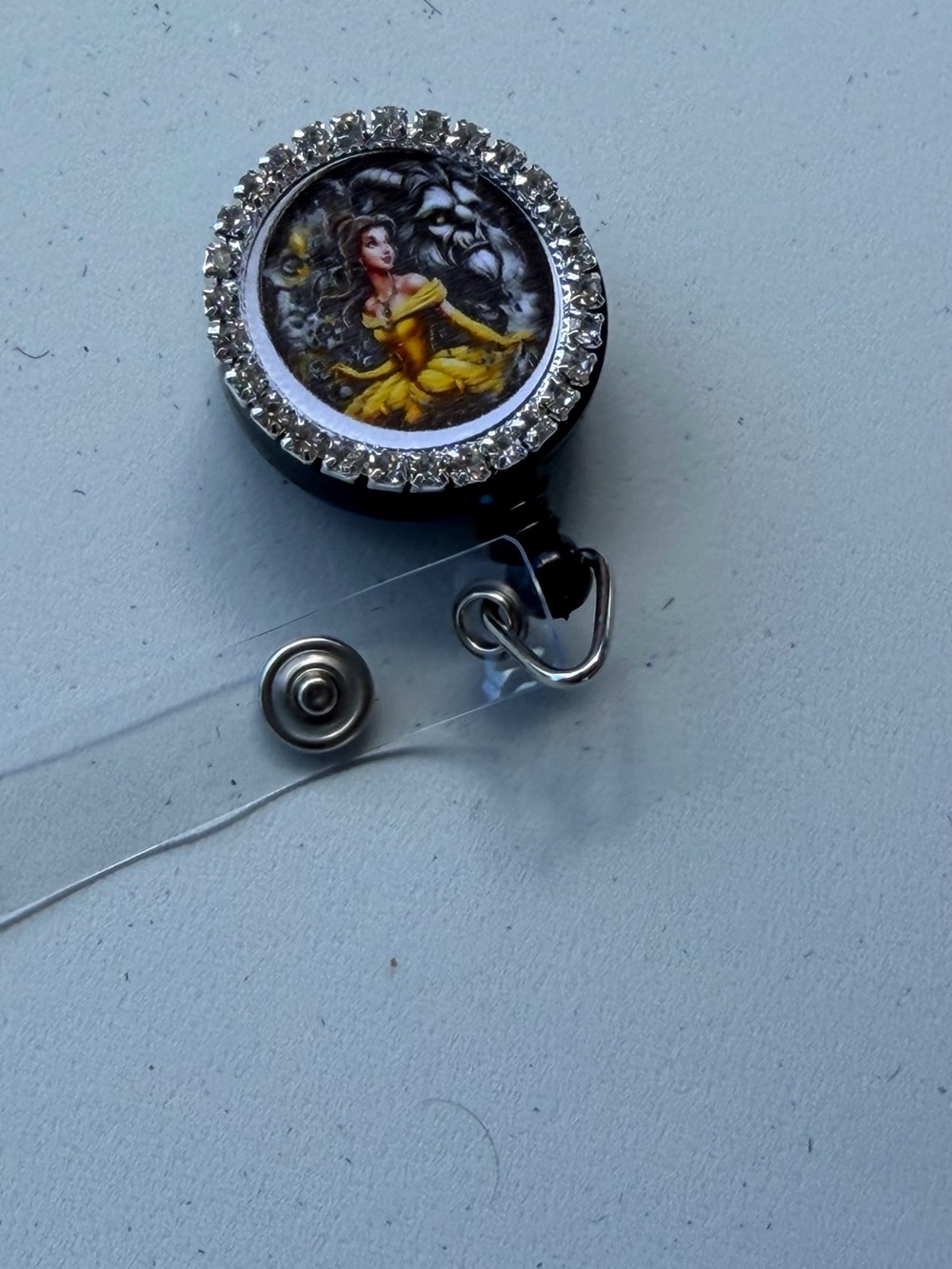 Rhinestone Badge Reel with Yellow Dress Illustration